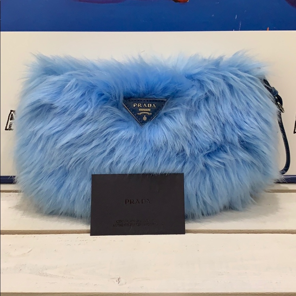 💯 authentic Prada faux fur blue mini clutch